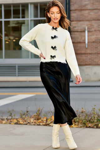 DREW IVORY BOW BUTTON SWEATER