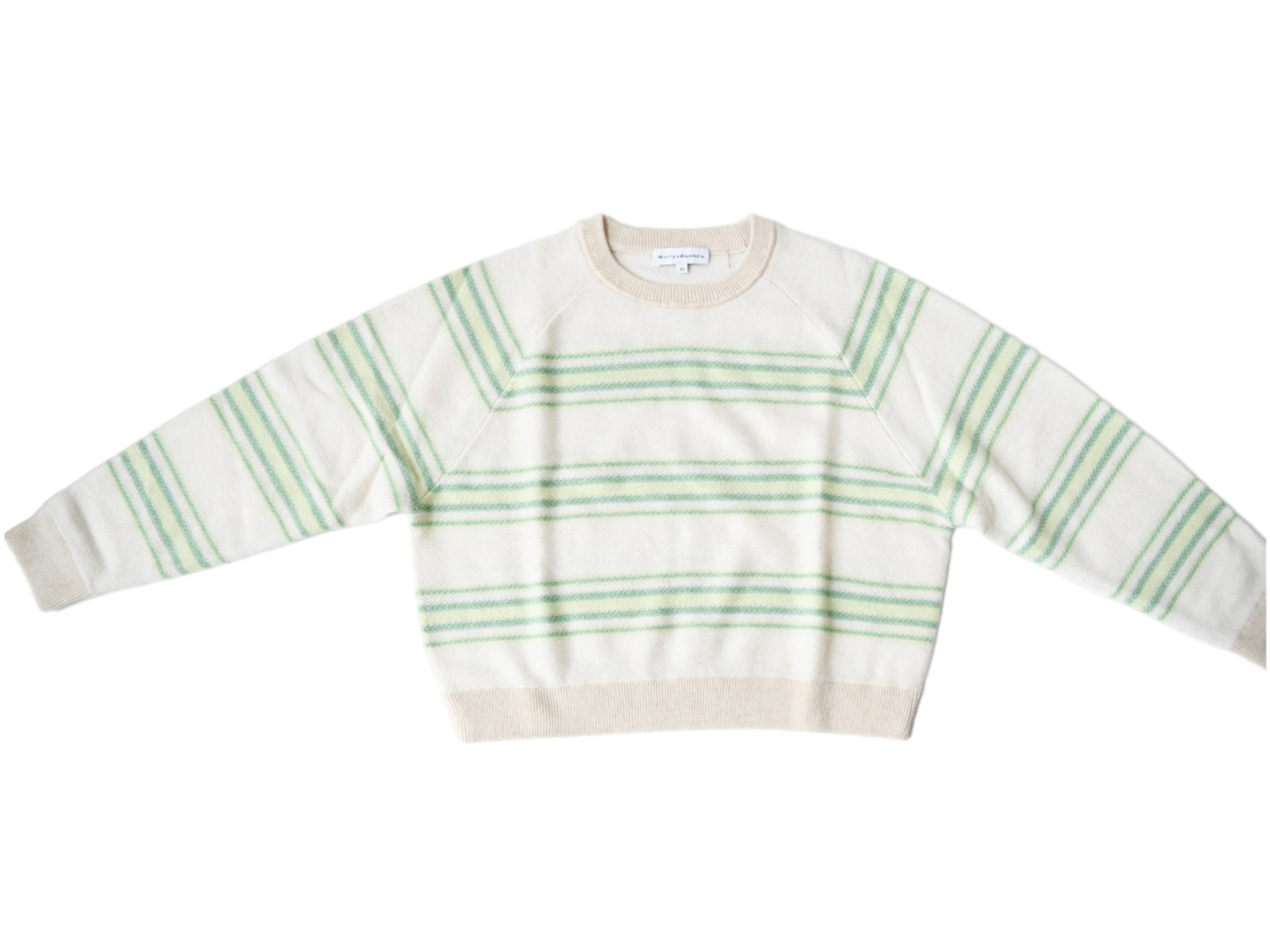 White and top green sweater